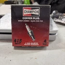 Box Of Champion Copper Plus Spark Plugs 415 RN9YC New Old Stock. Fixed Price $10.99.